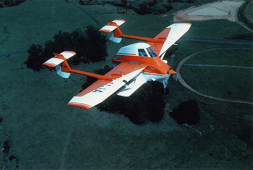 1980s. Airtruk in flight over Seven Hills.