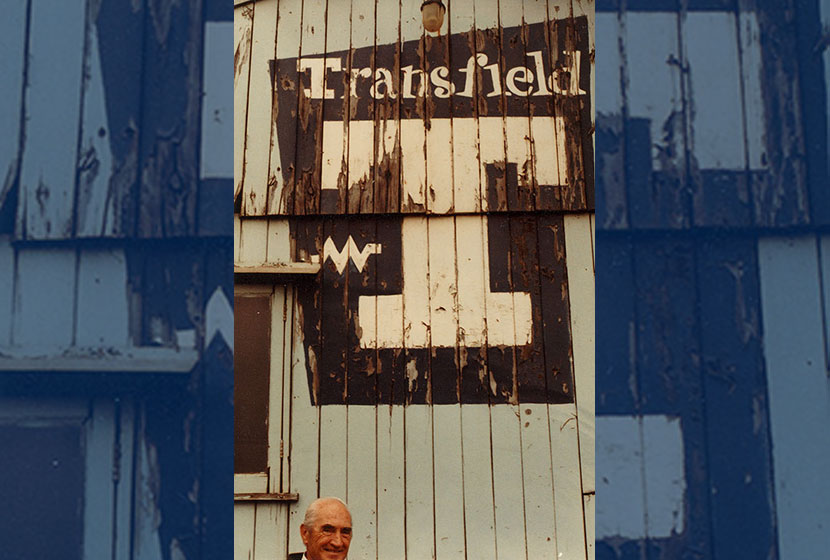Franco in front of the original, 1956 signage at the Port Kembla timber office.