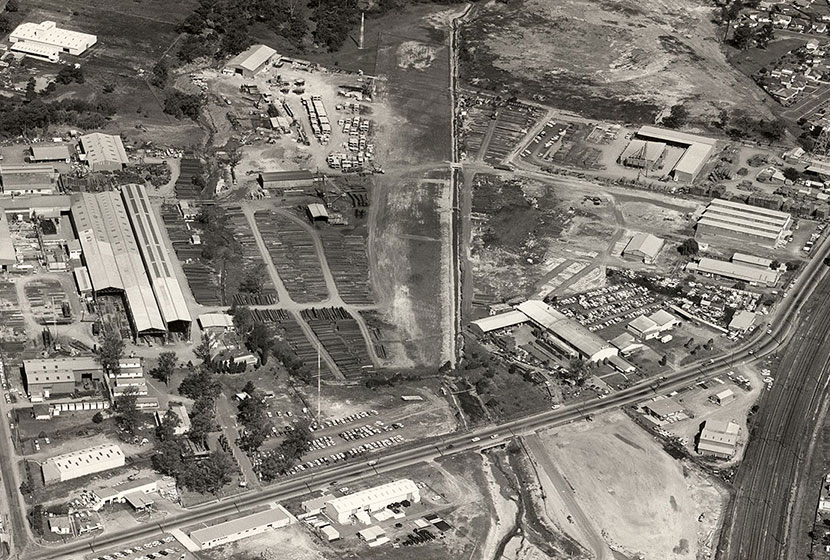 1970. Aerial view of Seven Hills factory complex. In the middle is Transavia’s airstrip.