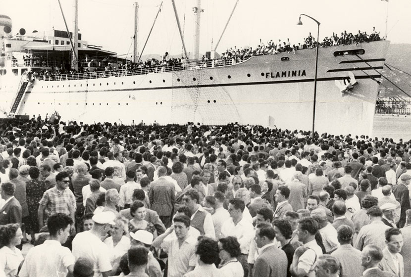 1955. The migrant ship MV Flaminia leaving Trieste for Australia.
