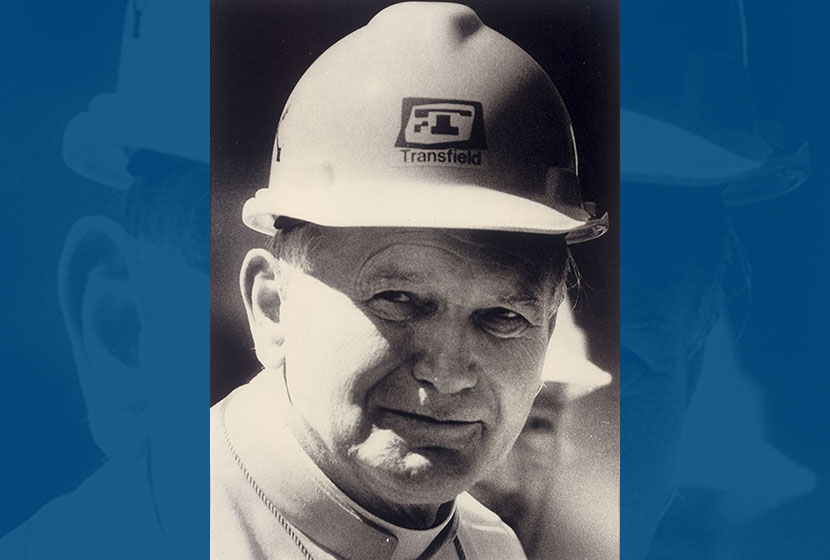 The famous photo of John Paul II wearing Transfield’s safety helmet.