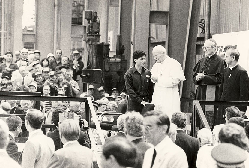 Seven Hills, November 1986. The Pope addresses the crowd assembled in one of Transfield’s buildings.