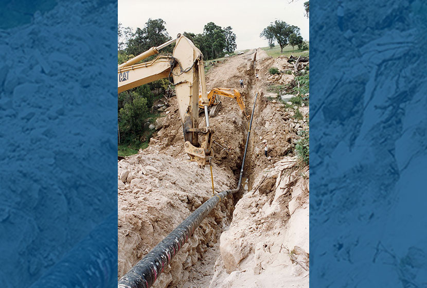 1996. Lying down a pipe on the Moomba-Sydney Natural Gas Line.